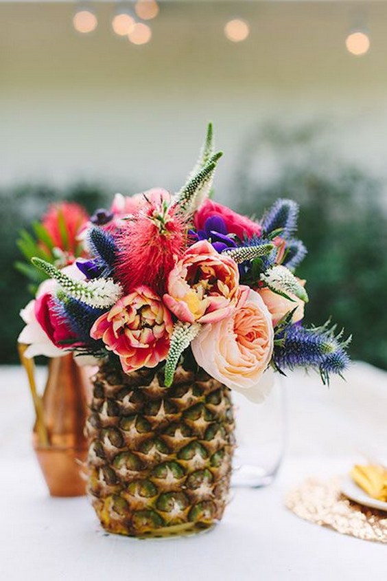 30 Chic Aloha Tropical Bridal Shower Ideas 11 Pineapple vase of flowers