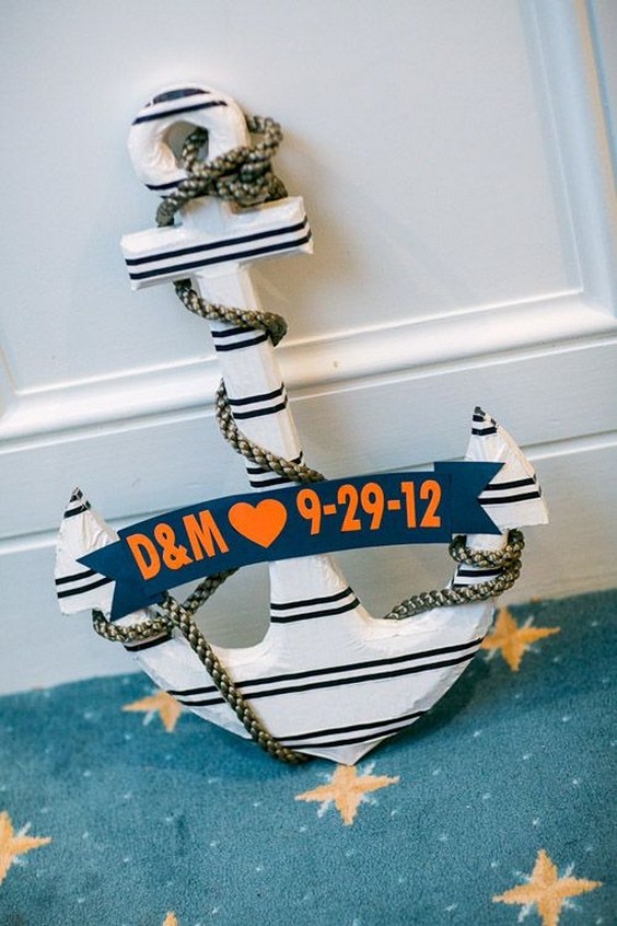 adorable anchor decor for navy and orange nautical style wedding