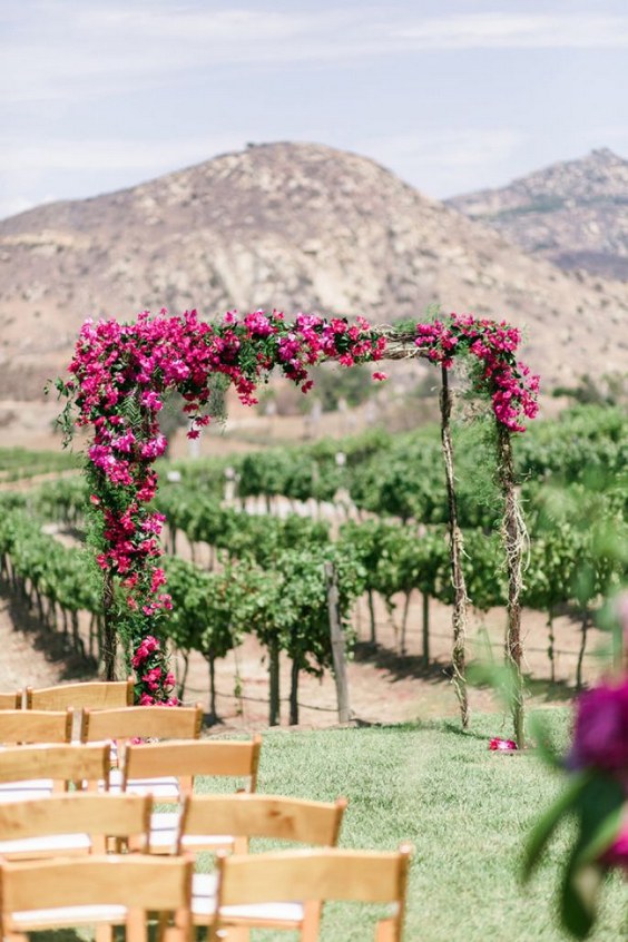 brightest fuchia florals wedding arch