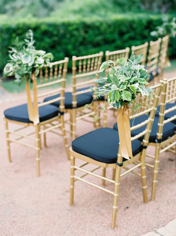 gold and navy blue wedding chair decor