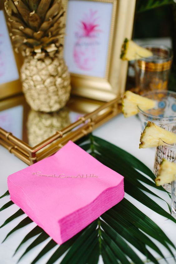 hot pink napkins against the leafy greens