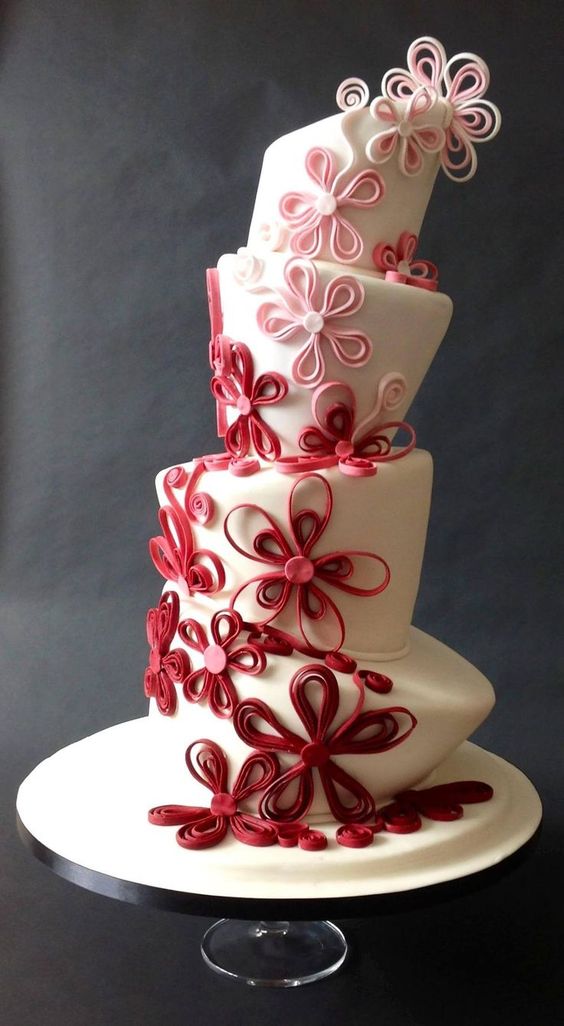 red ombre topsy turvy wedding cake