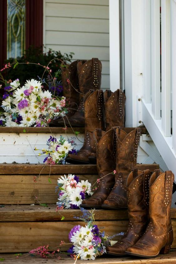 rustic country cowgirl bridesmaid boots and flowers