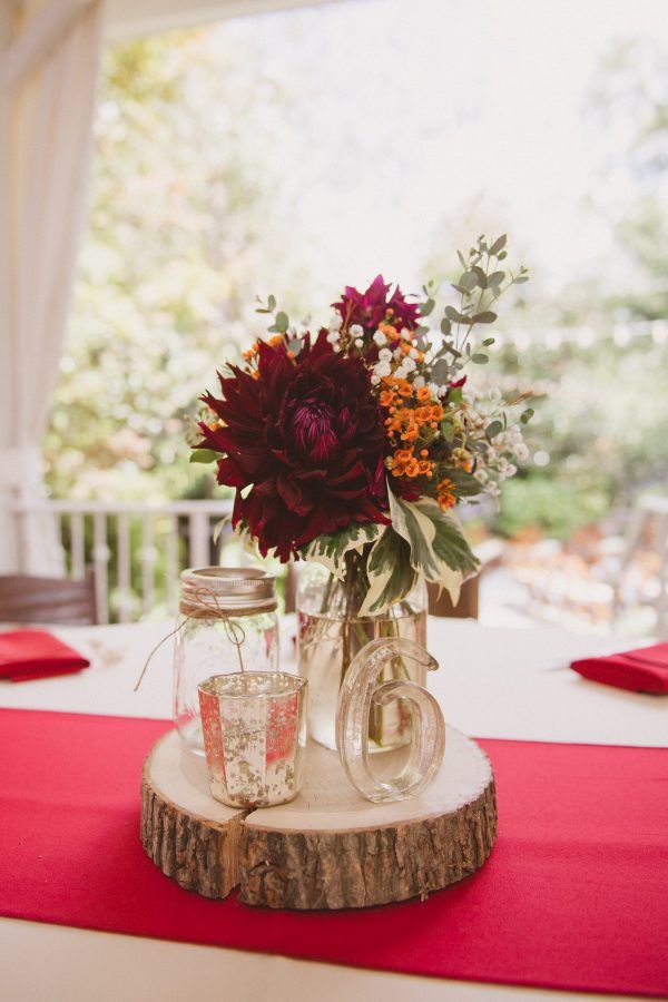 rustic fall burgundy and burnt orange mason jar centerpiece