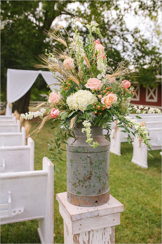 rustic milk jug wedding ceremony flowers