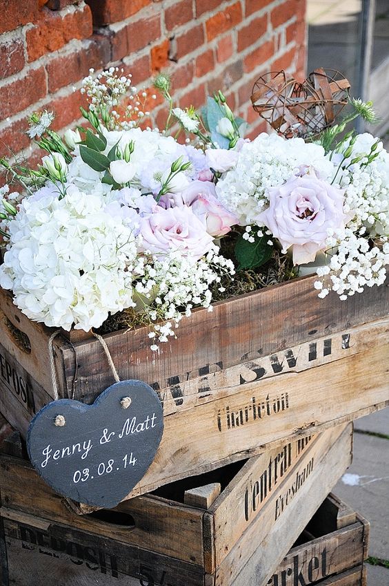 rustic wedding stack 3 wooden crates and add flower to the top crate for a wonderful entrance display