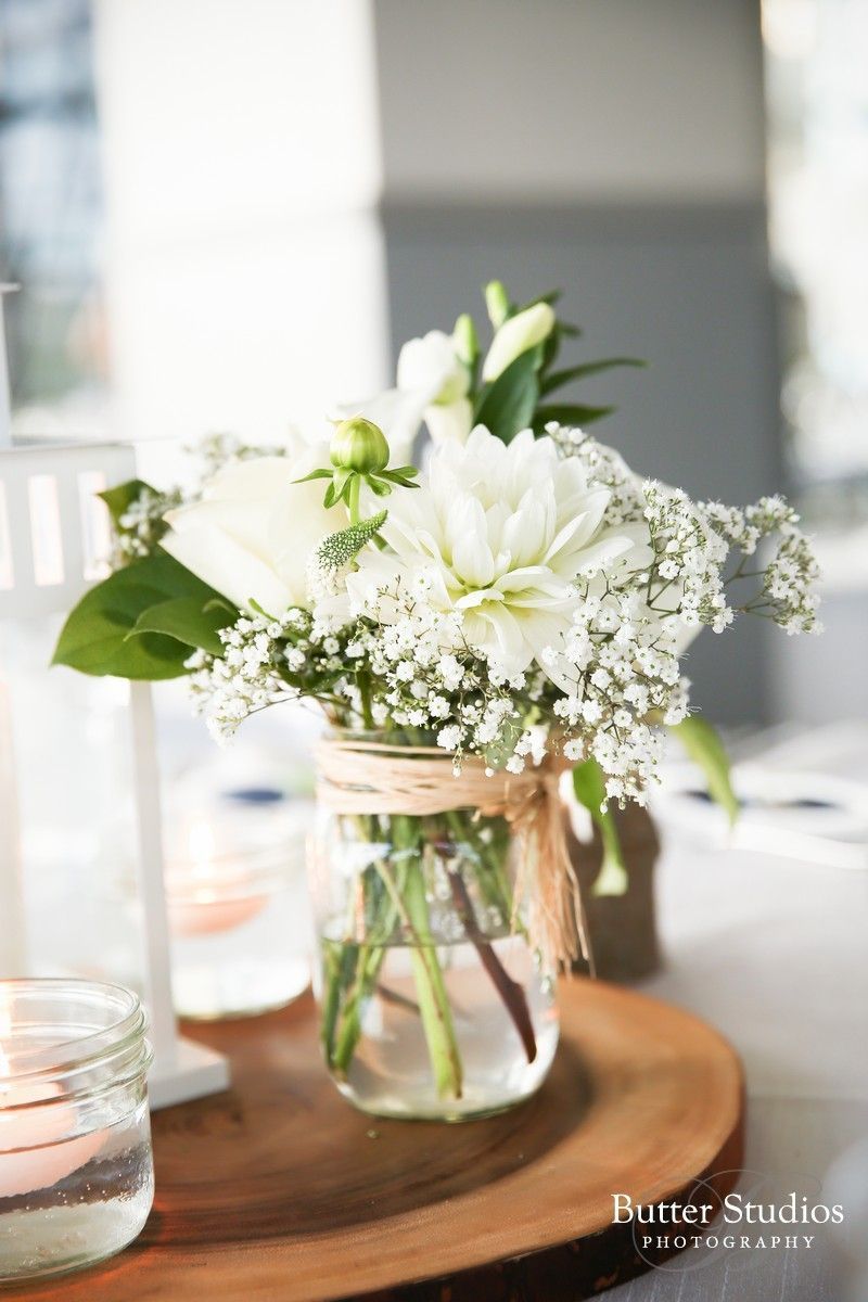 rustic white flowers mason jar wedding centerpiece
