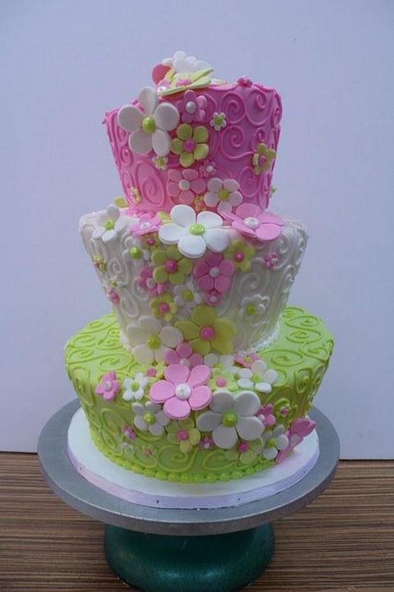 topsy turvy swirls flowers wedding cake