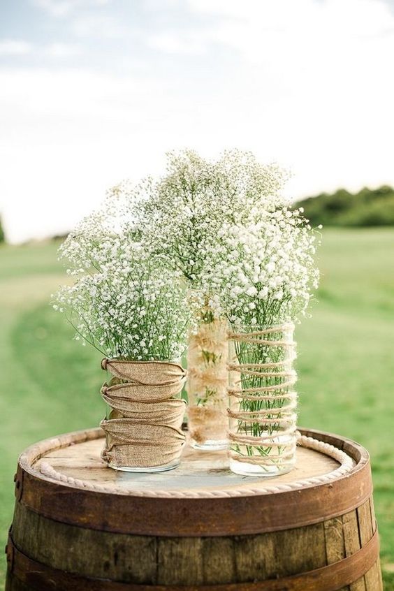 twine covered mason jars babys breath wedding centerpiece