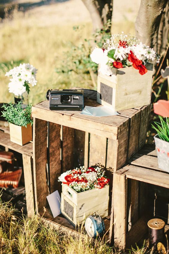 wooden crates as tables to display florals and decor