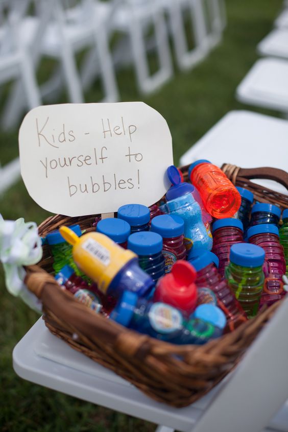 Bubbles at the outdoor wedding or reception to keep the little ones busy