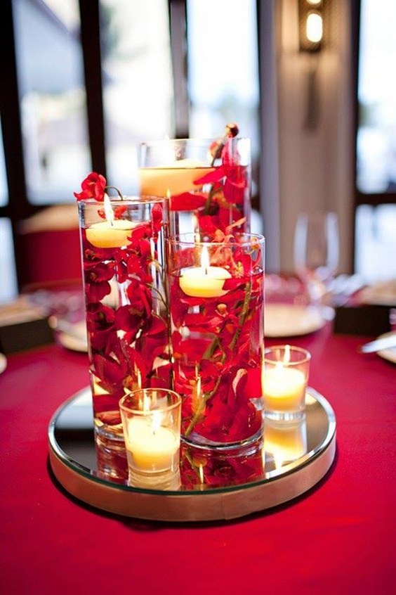 DIY red wedding submerged floral centerpieces