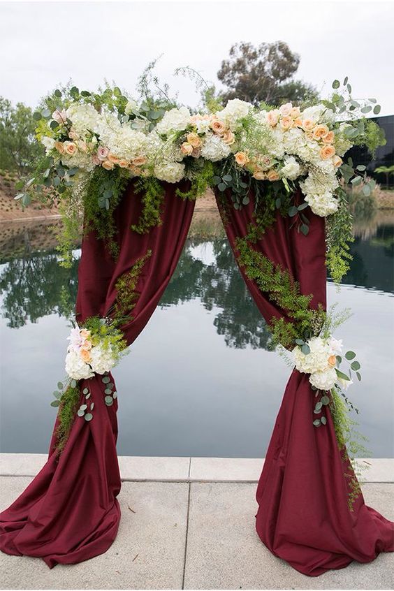 Marsala peach rose wedding arch