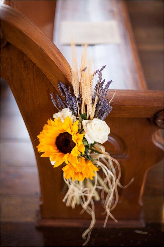 Simple sunflower wheat and lavendar aisle decor
