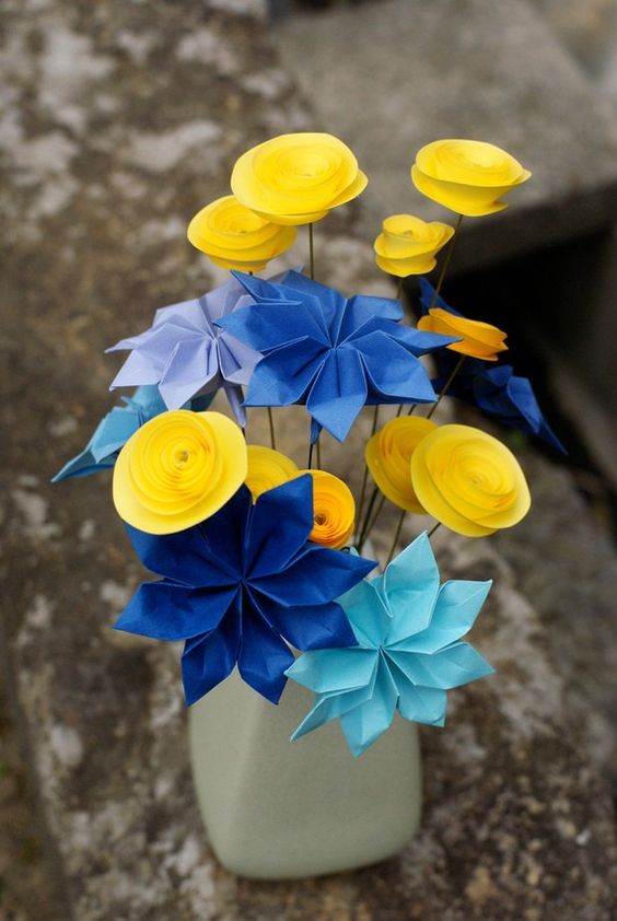 blue and yellow paper flowers wedding centerpiece