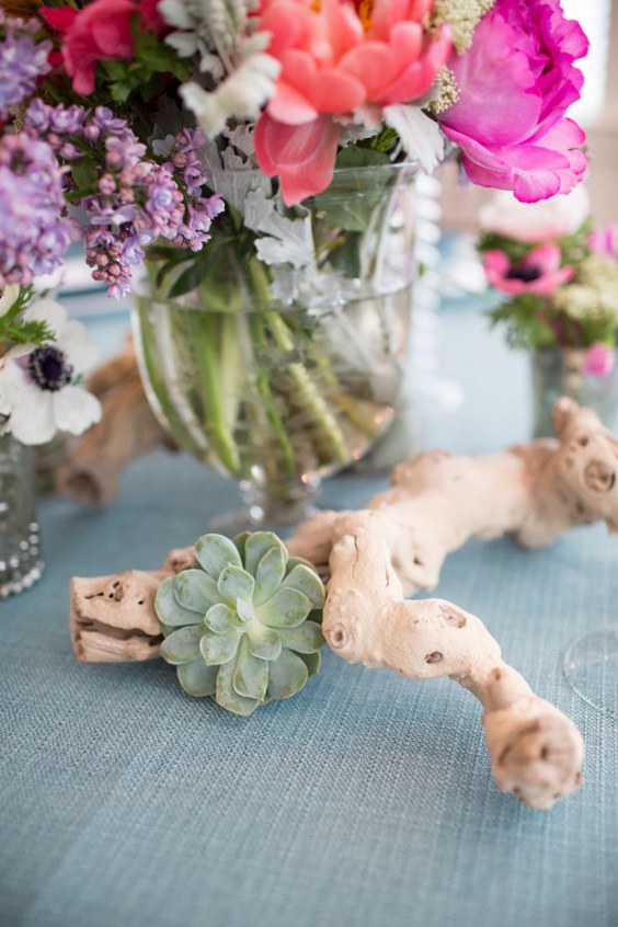 bohemian driftwood and succulent wedding centerpiece