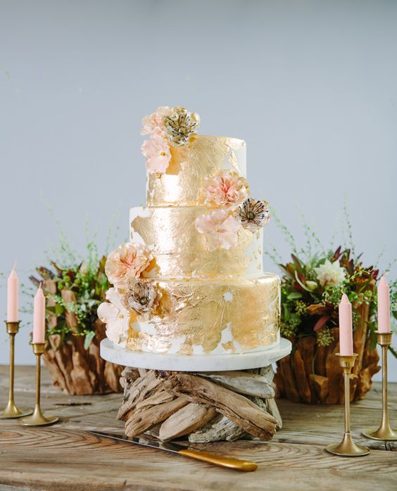 gold wedding cake with flowers