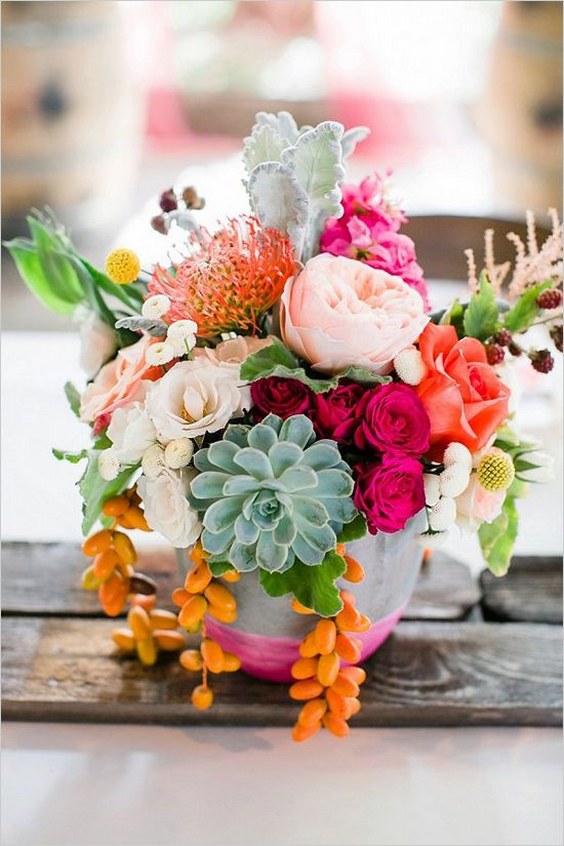 hot pink and orange wedding centerpiece