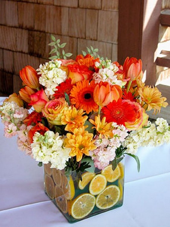 orange and white flower arrangements wedding centerpiece