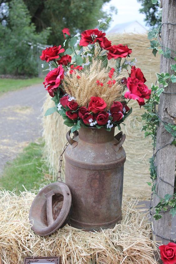 rustic country wheat roses milk churn wedding decor