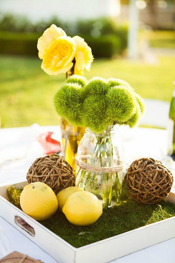 rustic moss and lemon wedding centerpiece