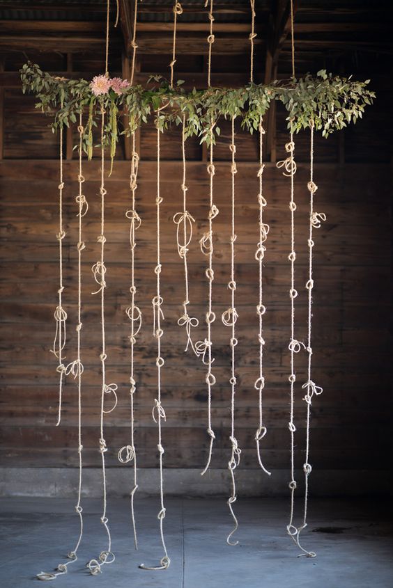 tying the knot rope wedding backdrop idea