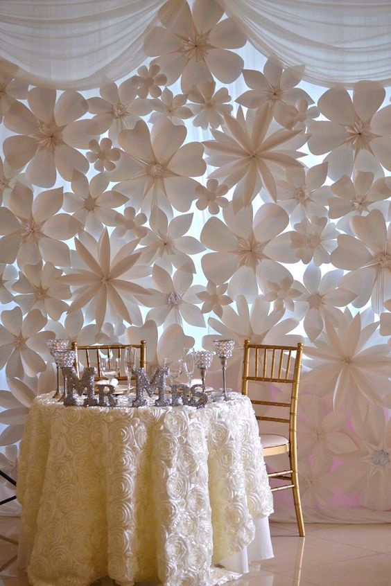 white paper flowers wedding backdrop