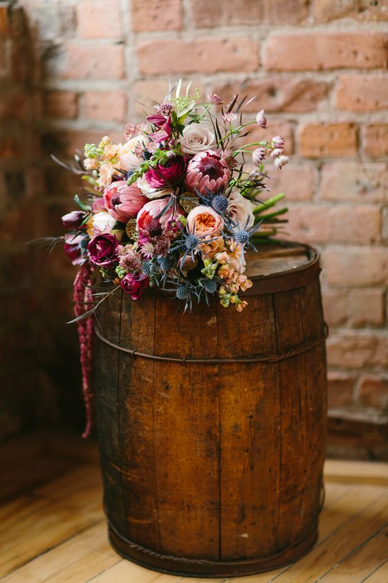 Lush Wedding Bouquet in burgundy with accents of pink