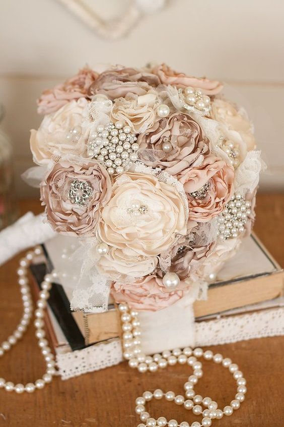 peach roses and pearls wedding bouquet