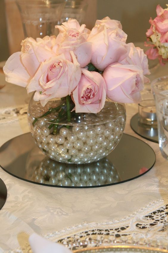 pink roses and pearl wedding centerpiece