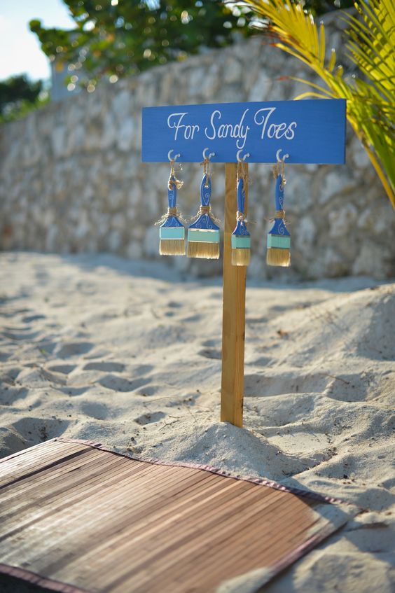 beach wedding detail brush for sandy feet