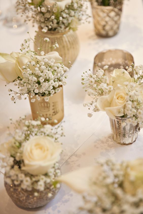 gold votives white flowers baby breath gypsohila tables centrepiece