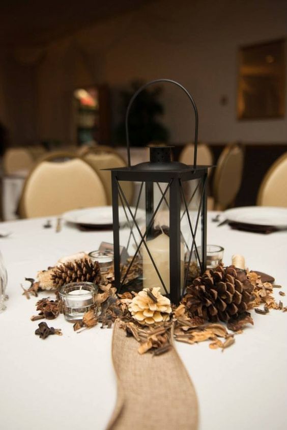 lantern pinecone winter wedding centerpieces
