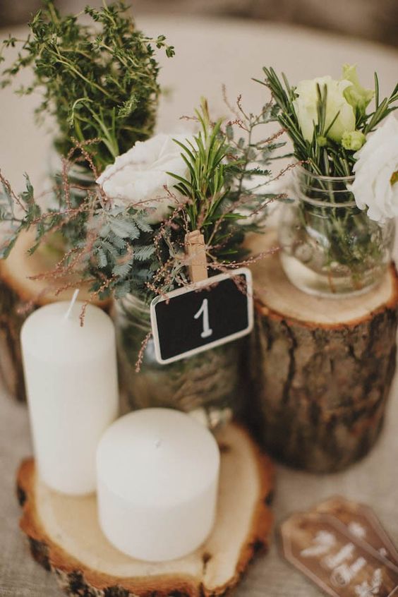 rustic tree stump wedding centerpieces via darya elfutina