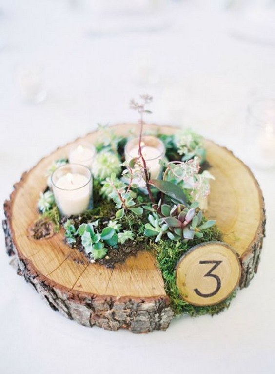 succulent moss and votive wedding centerpiece