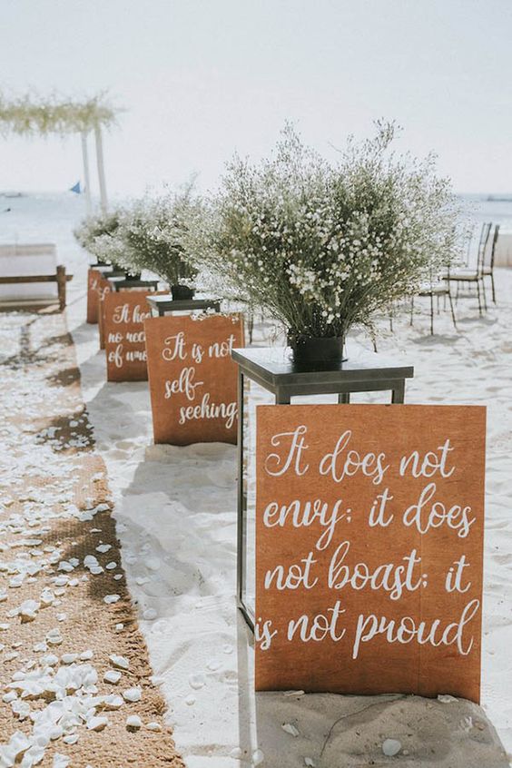 40 Fun and Easy Beach Wedding Ideas for 2024 3 vintage beach wedding sign