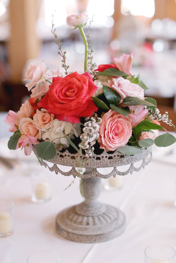 whimsical pink floral wedding centerpiece via photography by gem
