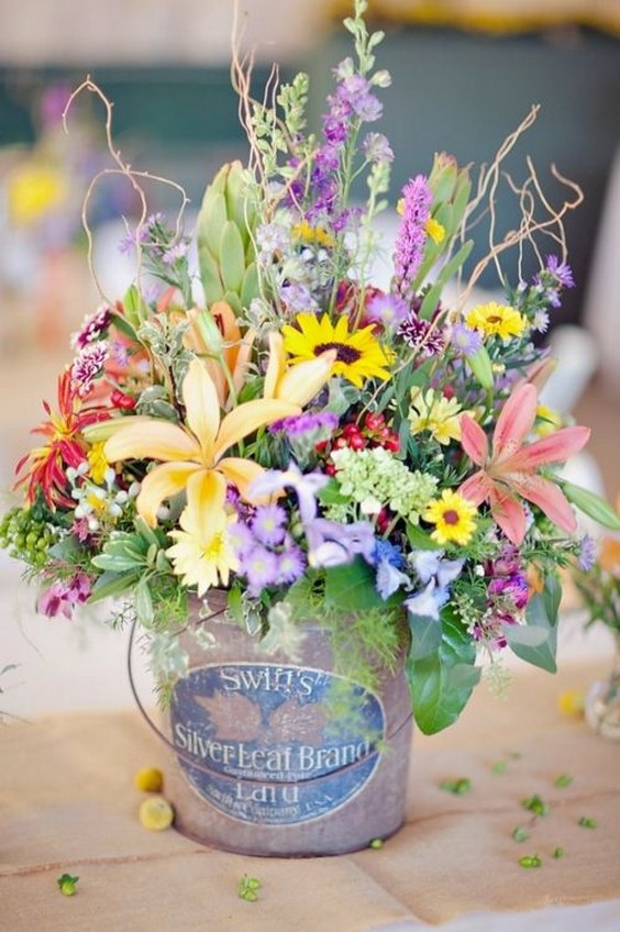 wildflower wedding centerpiece in a paint bucket