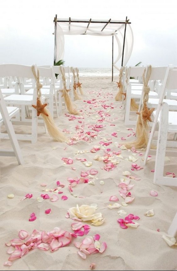 40 Fun and Easy Beach Wedding Ideas for 2024 2 pink beach wedding aisle decor