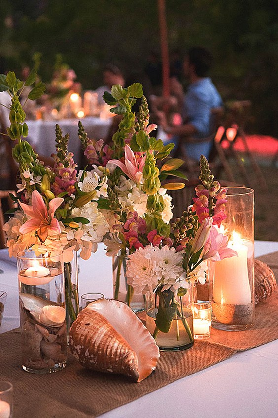 40 Fun and Easy Beach Wedding Ideas for 2024 10 rustic beach wedding centerpiece via sylvia guardia m