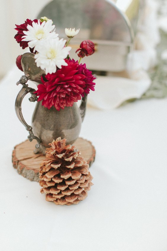 rustic fall pinecone wedding centerpiece