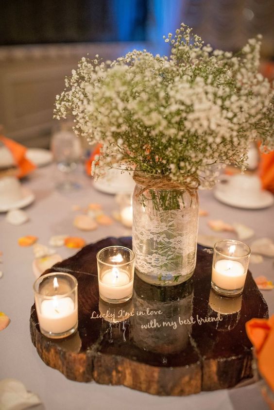 tea lights surrounding the ball jar wedding centerpiece