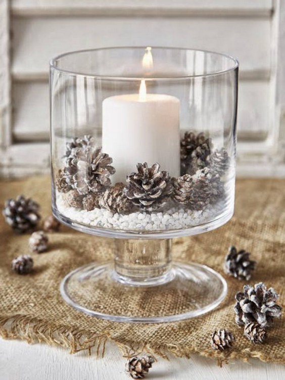 winter pinecone and candle wedding centerpiece