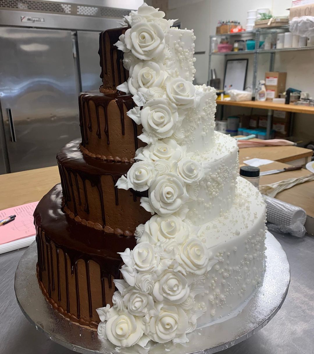 4 tier half drip chocolate and half elegant white floral pearl wedding cake via countrysweetsbakery