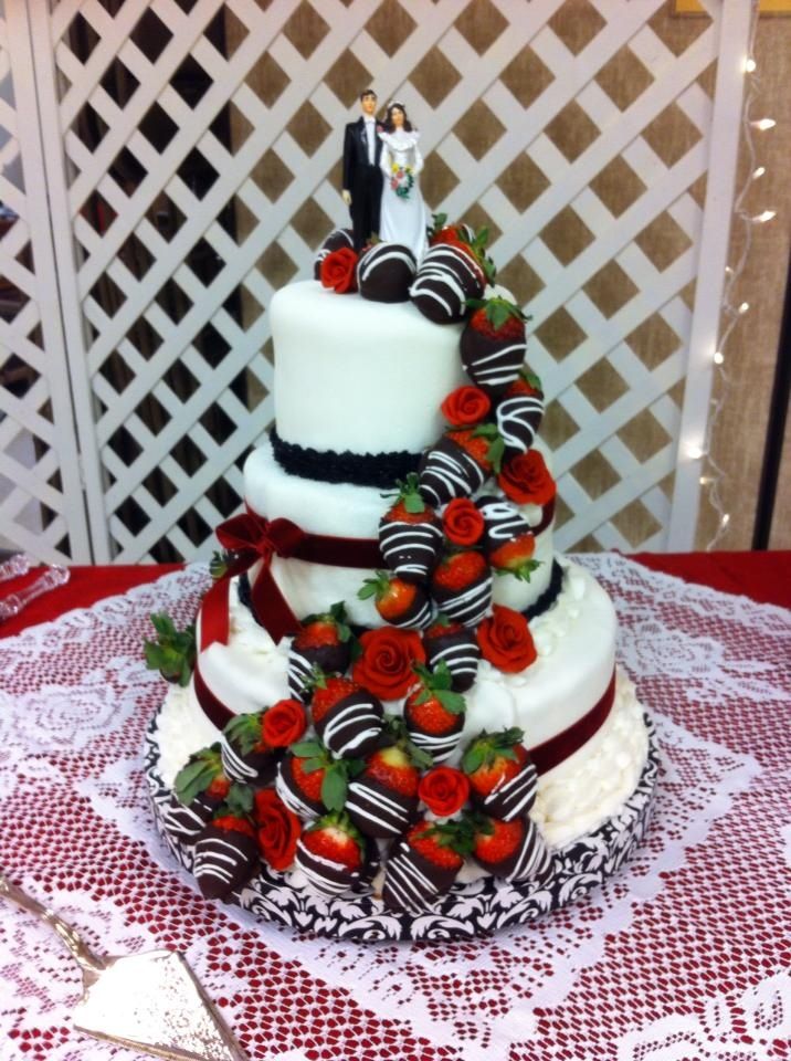 Chocolate strawberries wedding cake with couple topper