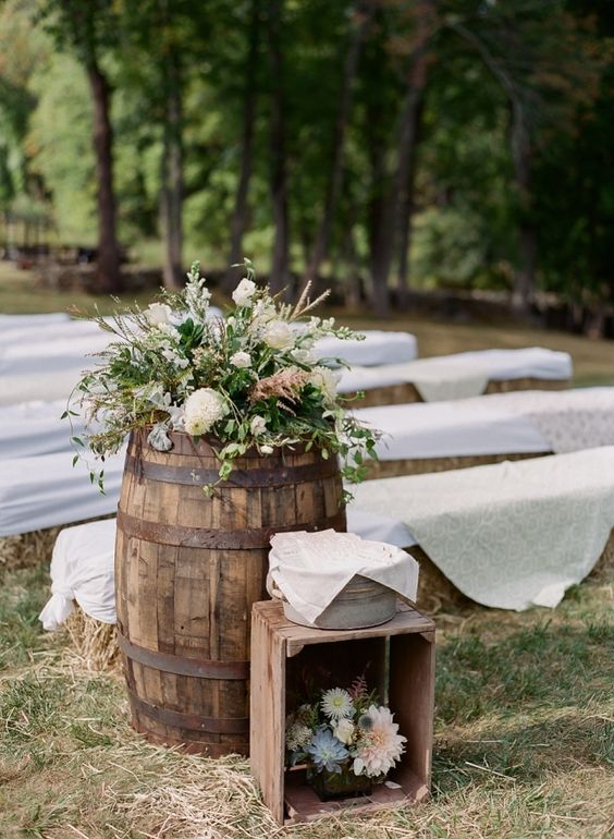 Rustic farm hay bale wedding ceremony decor via Photography Elena Wolfe