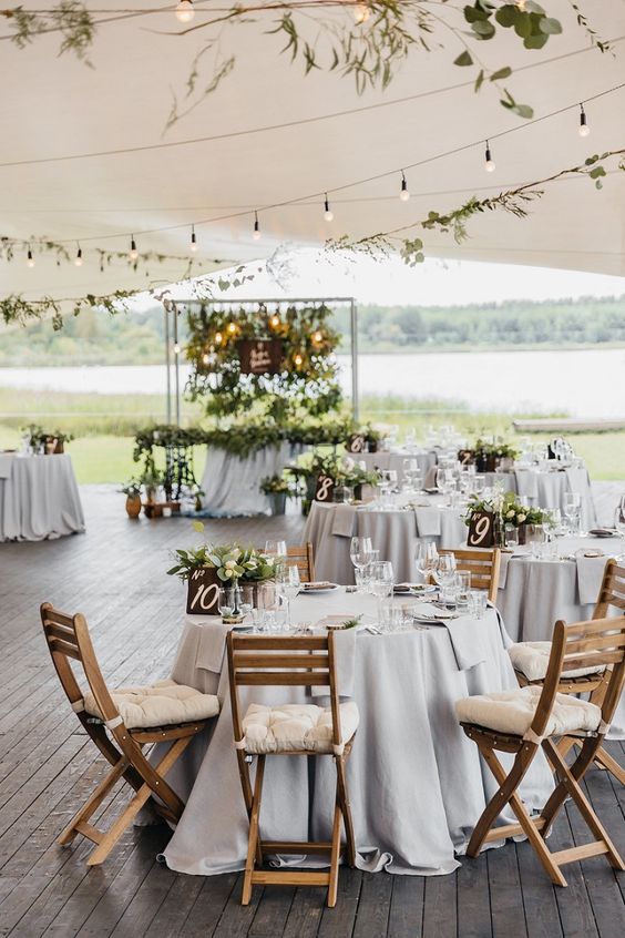 Summer rustic wedding reception under tent