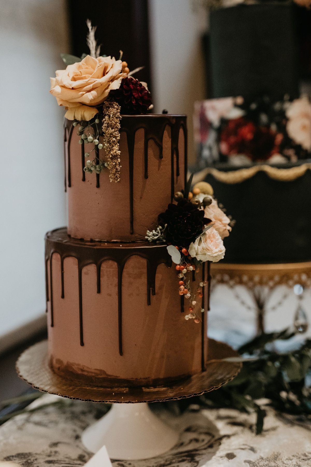 Two tier drip chocolate wedding cake