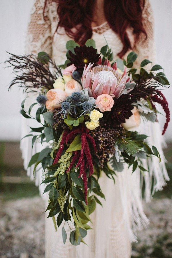 boho pink proteas and greenery eucalyptus wedding bouquet