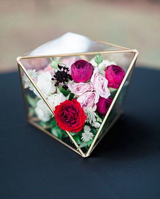 flowers in terrarium geometric wedding centerpiece